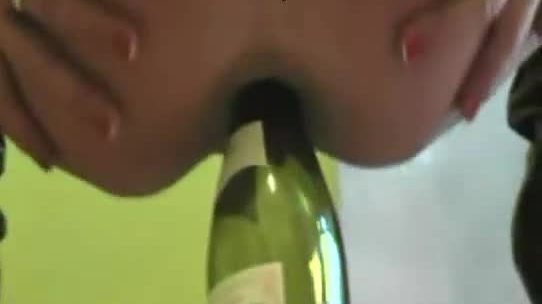 Kinky MILF takes bottle and cock in her ass